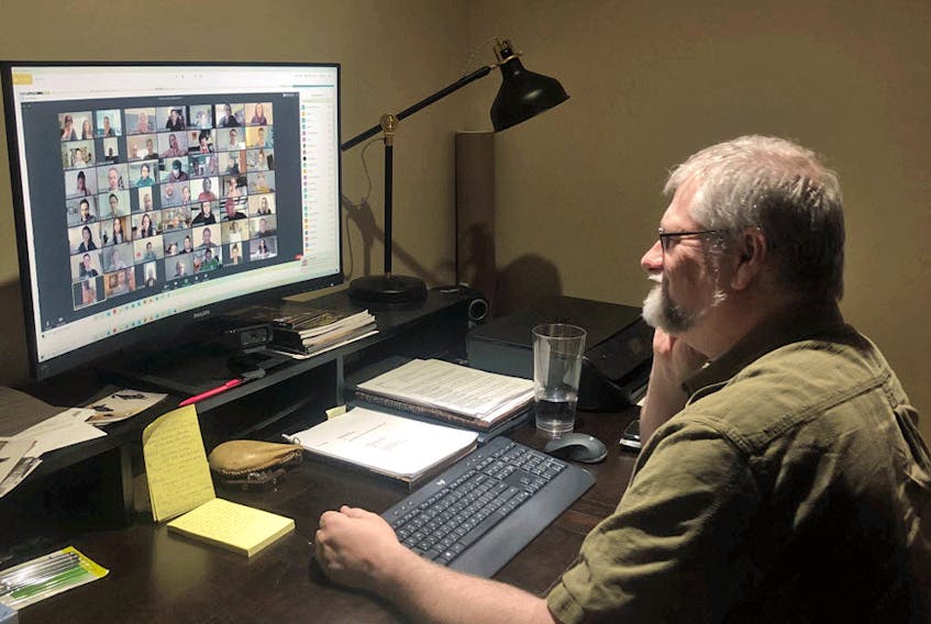  Tim Jennings, the executive director and CEO of the Shaw Festival, talks to members of the company on Zoom from his home office.