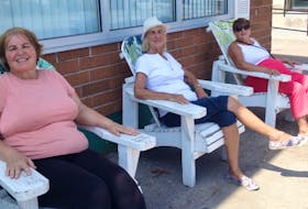 Sydney Mines residents Brenda Forrest, her mom Lavina Forrest and Janet MacRae say they are trying their best to fill time during the pandemic. On this day, they were enjoying a visit outdoors while respecting their social distance. CONTRIBUTED