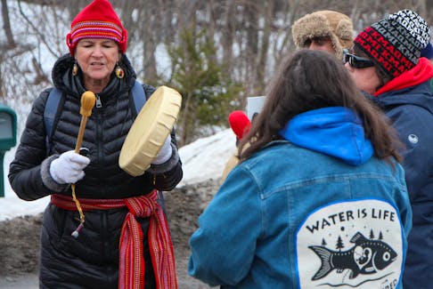 Messages, such as ‘water is life,’ were prevalent during a gathering of solidarity with Wet’suwet’en land defenders on Highway 104 in Auld’s Cove Saturday afternoon. Corey LeBlanc 