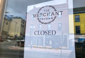 Many signs, such as this one at The Merchant Tavern, offer wishes of good health. -JUANITA MERCER/THE TELEGRAM