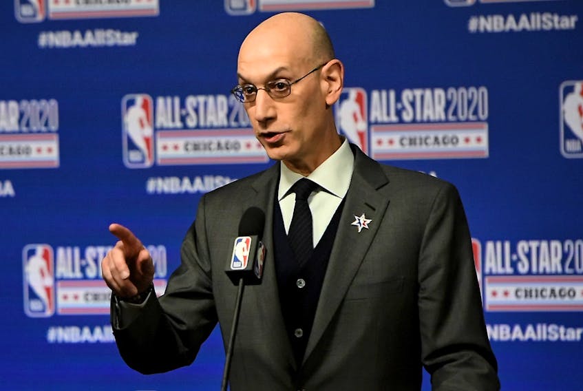 NBA commissioner Adam Silver speaks to the media during a press conference at the United Center in February. Silver will do his utmost to make things as safe as possible for everyone taking part when the league resumes play.