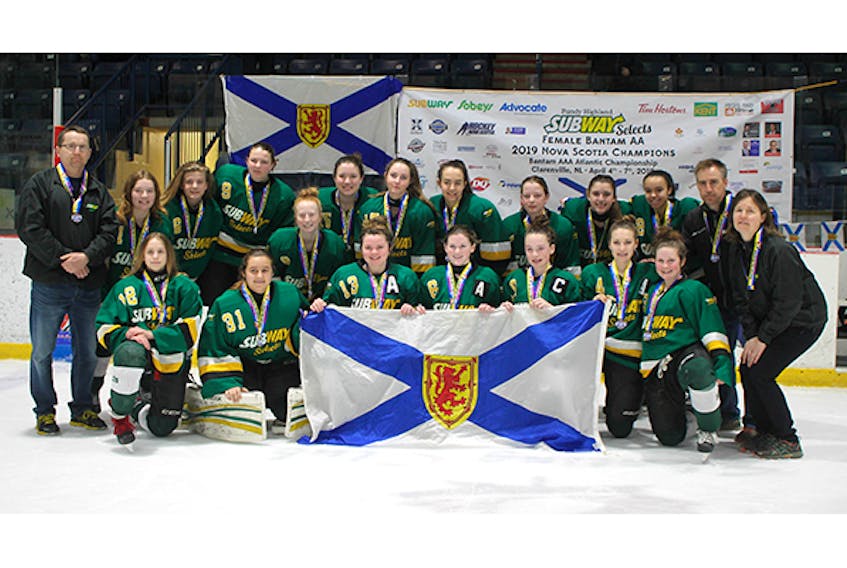 The Fundy Highland Bantam Selects. In front from left are: Jaylen Langille, Gabby Arsenault, Baillie Griffon, Julia Mae MacDonald, Ava Gennoe, Olivia Fitt, Megan Smith, Erin MacNeil and Tanya MacDonald (assistant coach). In back are: Trevor Fitt (assistant coach) Kenzie Greencorn, Madison Beson, Mairead MacPherson, Josie Dunn, Sarah Fraser, Emily Hart, Bree MacPherson, Ellie Clarke, Willa Evans and Bryan Smith (head coach).
