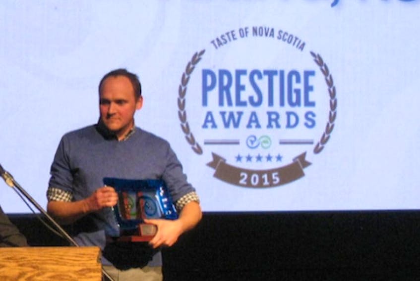 <p>Blomidon Estate Winery’s Simon Rafuse waits his turn at the microphone last fall when the winery won the Taste of Nova Scotia Prestige Award for producer of the year award.</p>