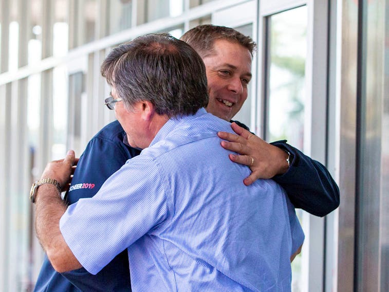 Leader of Canada's Conservatives Andrew Scheer greets Conservative candidate Costas Menegakis, as he campaigns for the upcoming election in Toronto, Ontario, Canada, September 18, 2019.  
