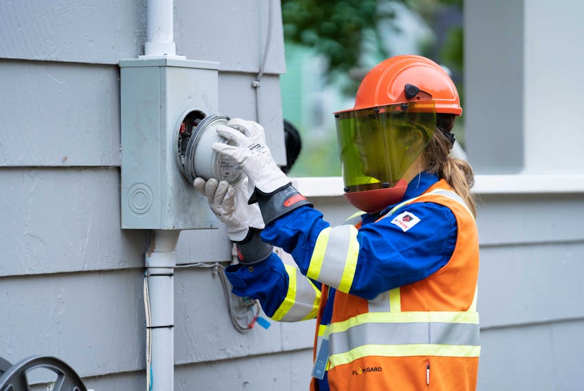 A Nova Scotia Power technician installs a smart meter in a customer's home. CONTRIBUTED • NOVA SCOTIA POWER 