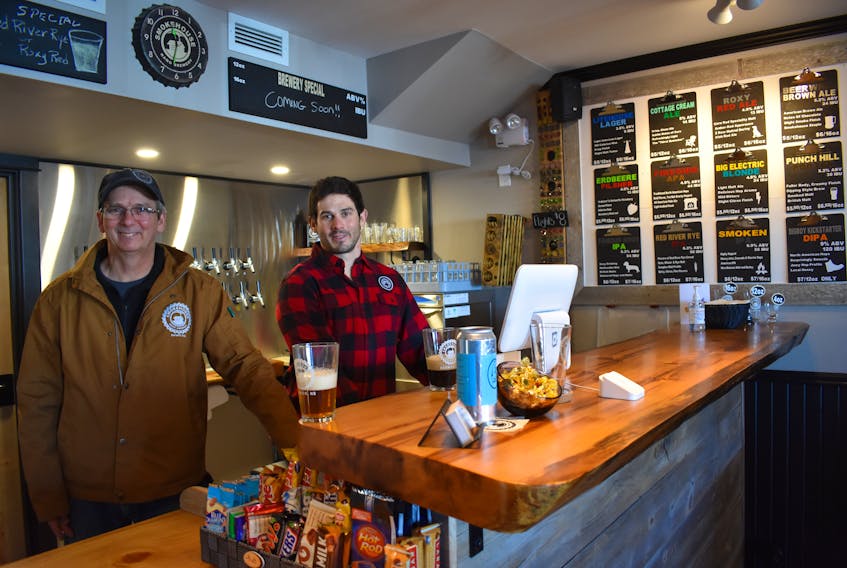 Father-son duo Mike and Andy Peters are encouraged by the support their family’s new Smokehouse Nano Brewery in Berwick is receiving so far. – Ashley Thompson
