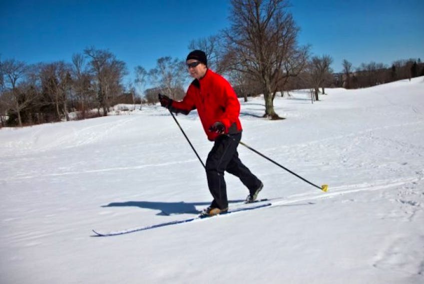 Spring? What spring? Liam Mulroy skiis over the snow packed greens at the Ashburn Golf Course on April 5 - Easter Sunday.