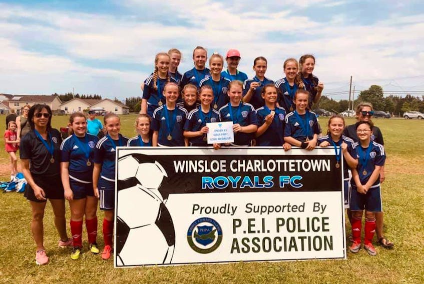The Summerside United captured the girls’ under-13 First Division championship at the Winsloe/Charlottetown Royals soccer tournament last weekend. Summerside edged the Eliot River Ramblers 2-1 in the final. Team members are, front row, from left: Maria McMahon (head coach), Chloe Warrick, Alexa McCarthy, Ava Allain, Hudsyn Sommers, Abby Simpson, Alivia Johnston, Rhyland Hearn, Emma McMahon, Bryn MacCallum, Chasity Campbell, Madalyn Easter and Nicole Martin (assistant coach). Back row: Avery Curry, Hailey Collicut, Jenna Boucher (an affiliated player from the under-13 Second Division team), Anna Gallant, Quinn Gavin (keeper), Kathryn Bernard, Nya Martin and Iyla Kilbride.