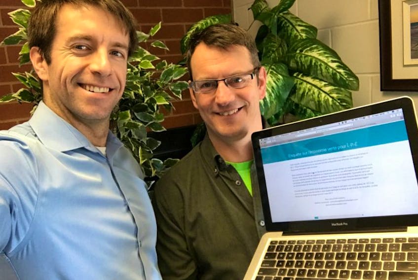 Mathieu Arsenault, president of Think Forward Solutions, and Stéphane Blanchard, economic development officer with RDÉE P.E.I., discuss the green economy survey that is being conducted among Island businesses and organizations.