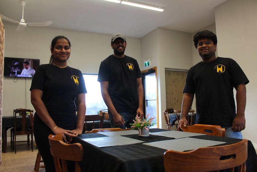The staff of the AHS South Indian Restaurant, from left, Veena Kurra, K. Priyatham and Kushal Reddy. Kurra and Reddy are co-owners. The restaurant specializes in south Indian cuisine. GREG MCNEIL • CAPE BRETON POST