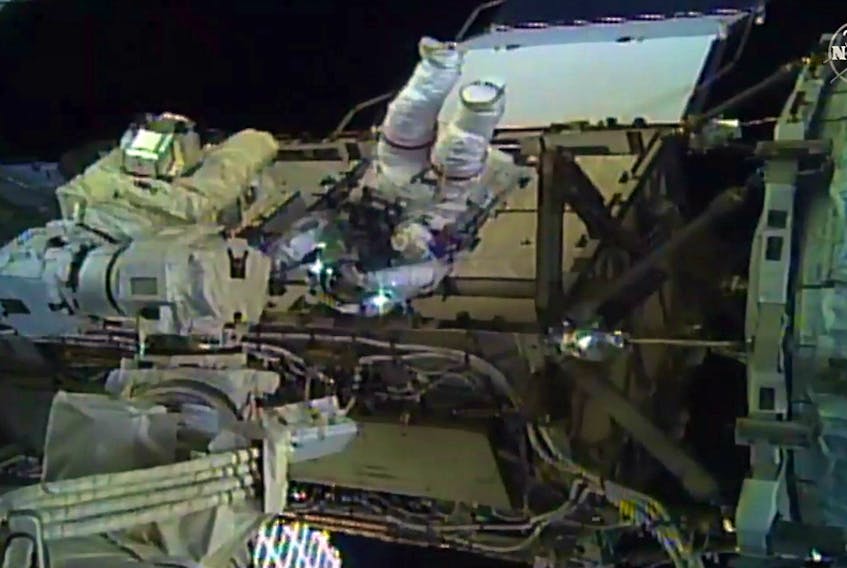 This image taken from NASA TV shows, astronaut Christina Koch during her spacewalk outside the International Space Station on October 18, 2019.