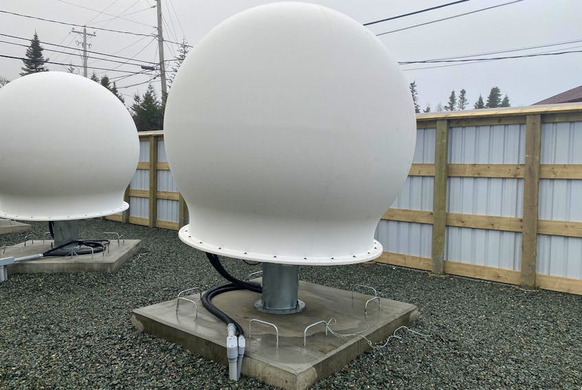 A picture of a SpaceX Starlink broadband internet uplink terminal installed at Eastlink's Duffy Place location in St. John's. — andrew867/reddit