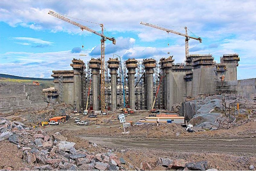 The concrete spillway structure at the Muskrat Falls site is nearly complete. In between each of those gaps, metal gates seven storeys high will be installed to control the flow of the river.&nbsp; On Monday, workers were doing one of the final cement pours of construction on this component; the very last pour here will happen Wednesday.