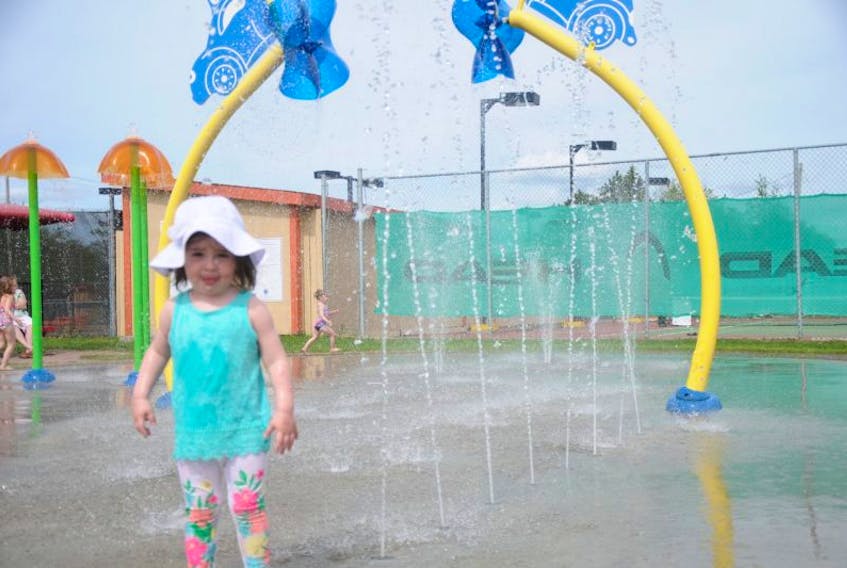 Nearly two-year-old Myla Winsor enjoyed the afternoon running through the streams of water at the Splash Pad in Gander.