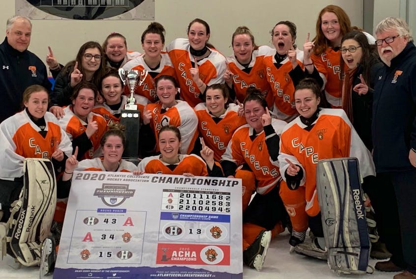 The Cape Breton Capers women's hockey team captured the Atlantic Collegiate Hockey Association championship with a 3-1 win over the Holland College Hurricanes at the Cavendish Farms Wellness Centre in Montague, P.E.I. on Sunday. The Capers last won the title in 2013. From left, front row, Leah Bynre and Jodi Dauphinee; middle row, Kayla Osmond, Abby MacDonald, Karlie MacNeil, Victoria MacIntyre, Alexa Poirier, Levia Denny and Grace Munroe; back row, Steve Horne (coach), Alex Barrett, Kaitlynn Hayes, Robyn LeBlanc, Emma Roland, Morgan Marks, Nicole Sloan, Charlotte Musick, Hannah Tobin and Derrick Hayes (coach). CONTRIBUTED/ACHA
