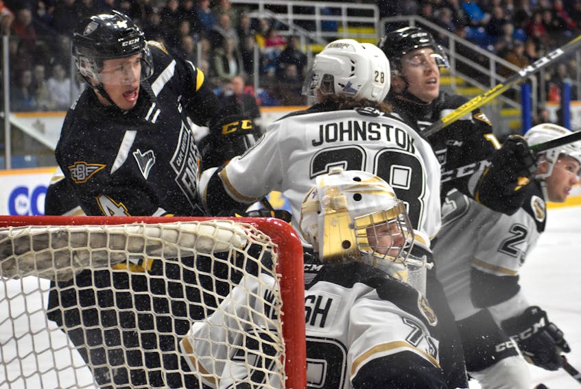 In this file photo, Nathan Larose of the Cape Breton Eagles, left, and Drew Johnson of the Charlottetown Islanders battle in front of the net during Quebec Major Junior Hockey League action at Centre 200. Cape Breton and Charlottetown will meet 12 times during the 2020-21 regular season, adding to an already stellar rivalry between the two teams. JEREMY FRASER/CAPE BRETON POST.