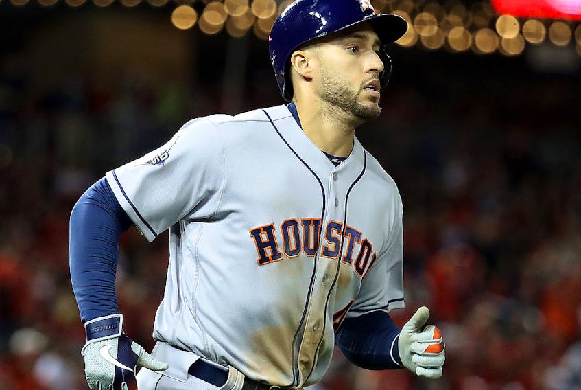 George Springer of the Houston Astros rounds the bases after his two-run home run against the Washington Nationals during the ninth inning in Game Five of the 2019 World Series at Nationals Park on Oct. 27, 2019 in Washington, D.C. 