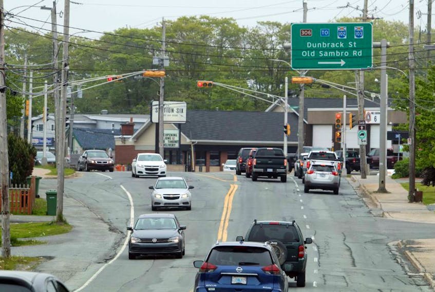 Traffic moves along Herring Cove Road in Spryfield on Friday, June 12.