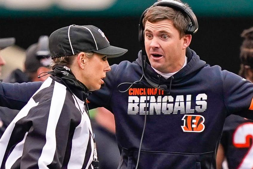 Head coach Zac Taylor of the Cincinnati Bengals argues with an official during an NFL football game. 