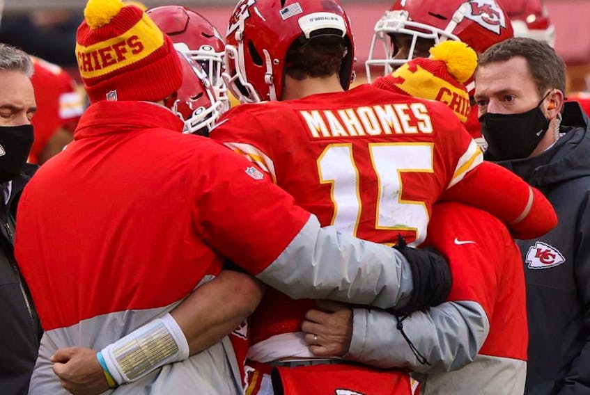Quarterback Patrick Mahomes of the Kansas City Chiefs is assisted off the field after an injury from a sack that would remove Mahomes in the third quarter of the AFC Divisional Playoff game against the Cleveland Browns at Arrowhead Stadium on Jan. 17, 2021.