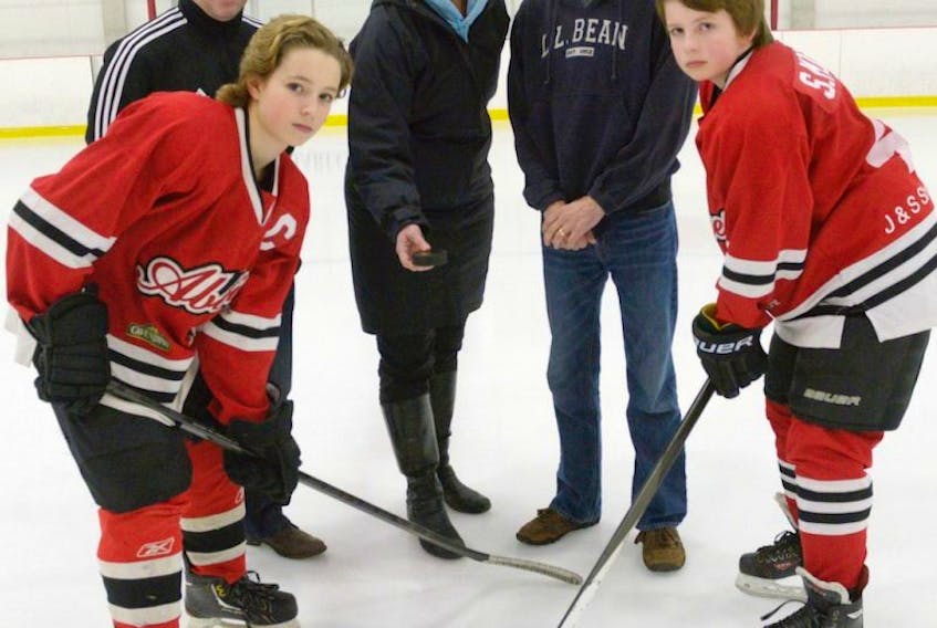 The 39th annual Spud minor hockey AAA tournament begins Thursday at rinks in and around Charlottetown. Promoting the tournament, from left, are Declan MacEachern, a member of the Charlottetown peewee AAA Abbies, Bruce Donaldson and Tammy Muirhead, co-chairpeople of the event, Jeff Young, director of finance, and Seth Morris of the peewee AAA Abbies.