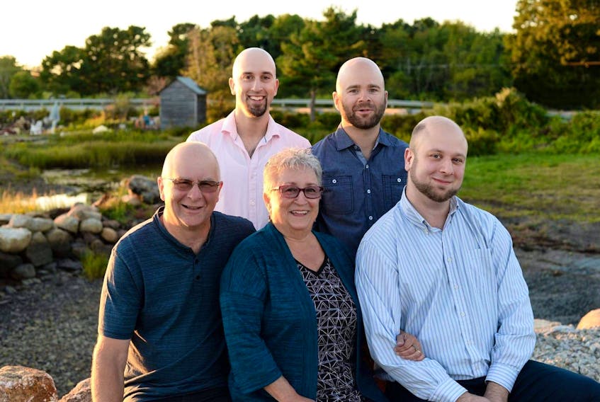 Reid Whynot and his wife Karen pose for a family photo with their three sons Christopher, Stephen and Jamie. Whynot has been recognized for his community dedication and dedicated voluntary services that spans more than 40 years with the Governor General of Canada’s Sovereign’s Medal for Volunteers. Contributed