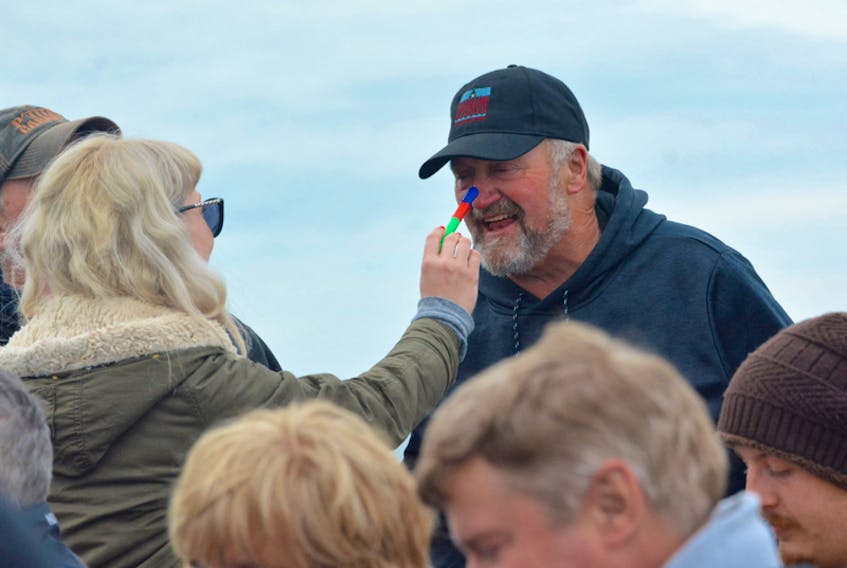 Harbour tour participants were busy getting their noses painted blue.