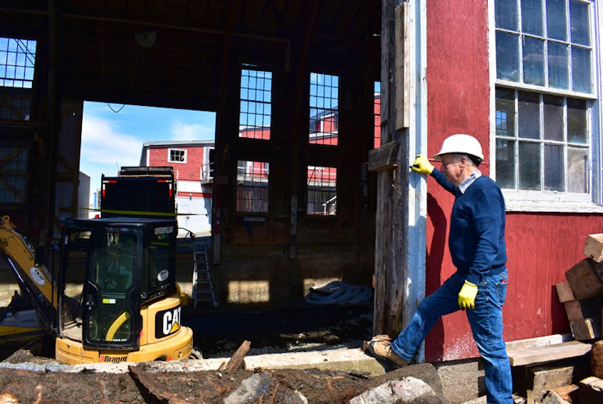 Alan Altass, who previously worked as a manager at Scotia Trawler (Smith & Rhuland Shipyards) looks on as work begins on the Big Boat Shed — one of Develop Nova Scotia’s key initiatives over the next five years.