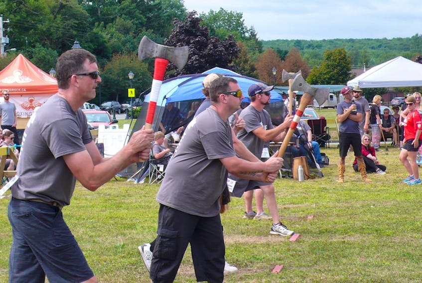 Axe thrower Brian Nickerson from Cape Sable Island (far left) prepares to unleash his axe during action in the 2018 competition held in Liverpool.