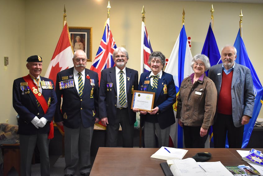 From left to right: Zone 13 Sergeant-at-arms Bob Henderson, Commander Darryl Cook, Royal Canadian Legion Branch 49 member Lloyd Westhaver, Branch president Helen Whitehouse, Mahone Bay councillor Penny Carver and Mayor Dave Devenne pose with their accessibility certification from the Nova Scotia Community Links Aging Well Together Program.