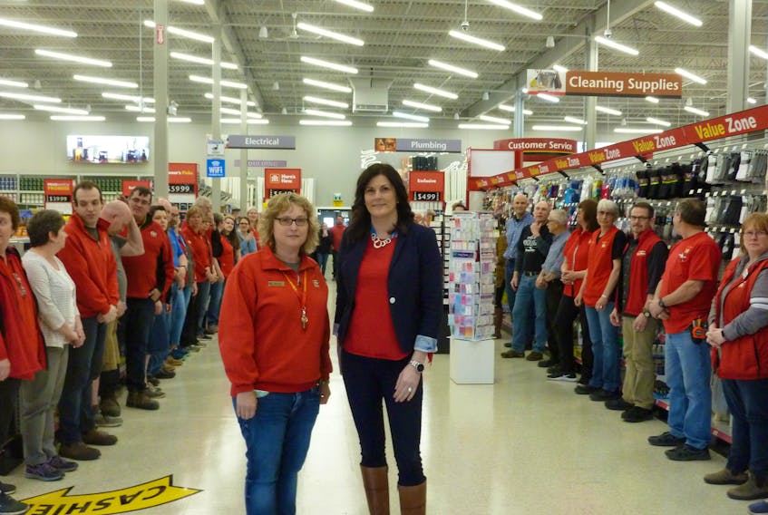Gow's Home Hardware and Furniture co-owners Amanda Fancy (left) and Julie Gow, along with their employees, prepare to greet the first customers at their new 58,000 sq. ft. store in Bridgewater on April 29. The 75 employees have worked for Gow's for a combined 680 years.