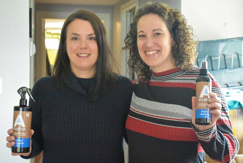 Cutline: Amanda Veinotte-Tanner (left) and Lisa Ali-Learning, AtlanTick Repellent Products CEO and founder, pose in the business’ Mahone Bay office. Ali-Learning said the ACOA grant has allowed the business to employ four people.