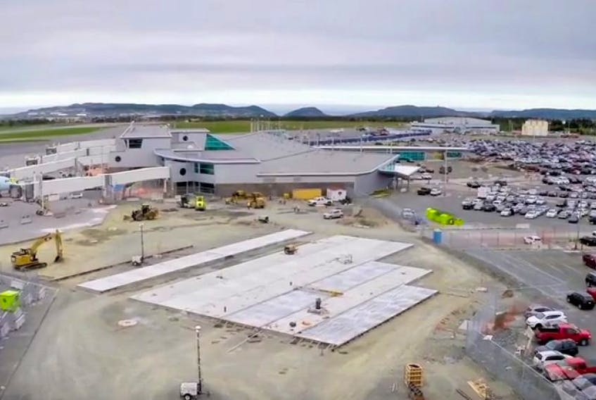 A screenshot from a video showcasing construction work at St. John's International Airport. The video is at <a href="http://bit.ly/1jAVaa6%20" target="_self">http://bit.ly/1jAVaa6 </a>