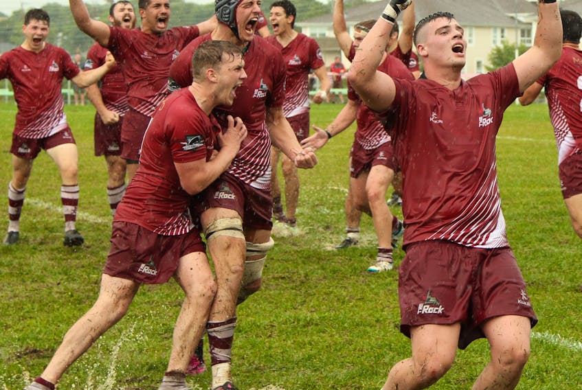 Members of the Atlantic Rock celebrate after winning the 2019 Canadian under-19 rugby championship final at Swilers Rugby Complex in St. John’s, where they defeated the Ontario Blues 21-5 for their first national U19 title in nine years. — Colin Squires
