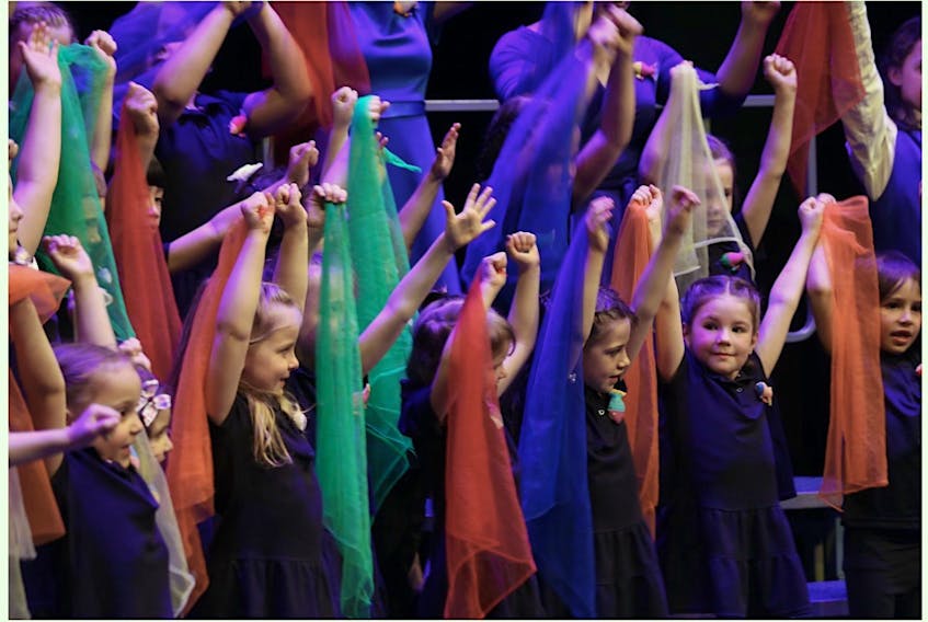 Members of Shallaway children’s choir show their enthusiasm during a pre-pandemic performance. Director Kellie Walsh says the younger ones will likely be the most ready to adapt to masks and other safety measures.