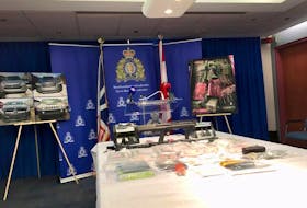 Items, including weapons, drugs and money, seized as part of Project Broken — an investigation into organized crime and drug trafficking — were displayed at RCMP headquarters in St. John’s Dec. 5, 2018. — ROSIE MULLALEY/Telegram file photo