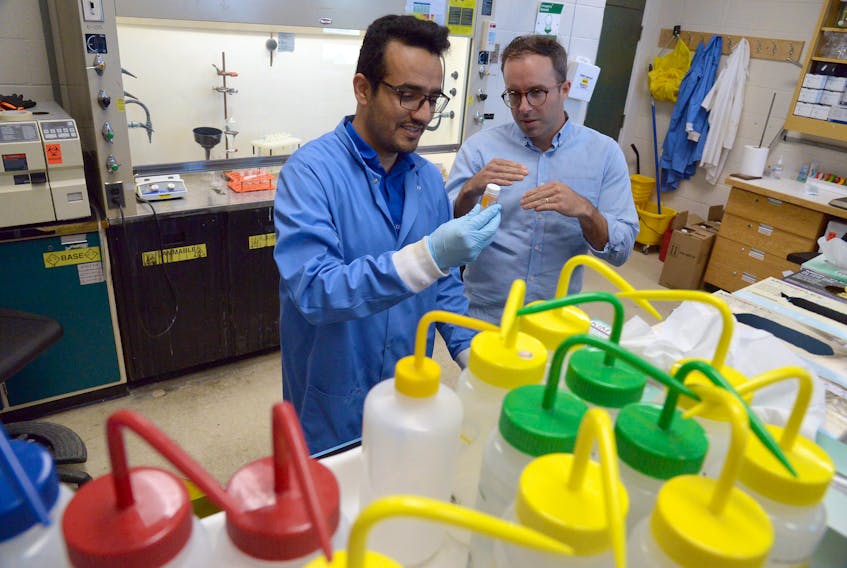 Unbound Chemicals of St. John’s has extracted the active ingredient in a common antidepressant from expired pills, months before the startup company expected to achieve its goal. Shown at the comoany's labs are CEO Blaine Edwards (right) and research chemist Ali Azizi. —  Keith Gosse/The Telegram
