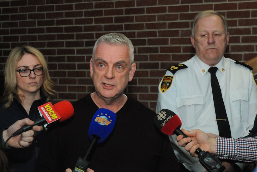 From left, City of St. John’s deputy city manager of public works LynnAnn Winsor, St. John’s Mayor Danny Breen and St. John’s Regional Fire Department Deputy  Fire Chief of Operations Rick Mackey speak with reporters Wednesday at the City Depot administrative offices on Blackler Avenue. Joe Gibbons/The Telegram