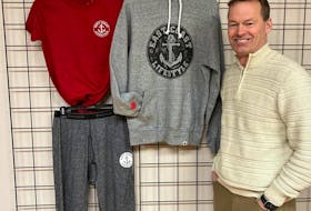 Rob Newcombe, vice-president of marketing and sales for Stanfield’s, stands beside a few of the items which are part of a winter collection, resulting from a partnership between Stanfield's and East Coast Lifestyles. 