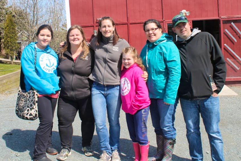 <p>Steadman and her family are pictured at Hope for Wildlife, where they made the donation. - Submitted</p>