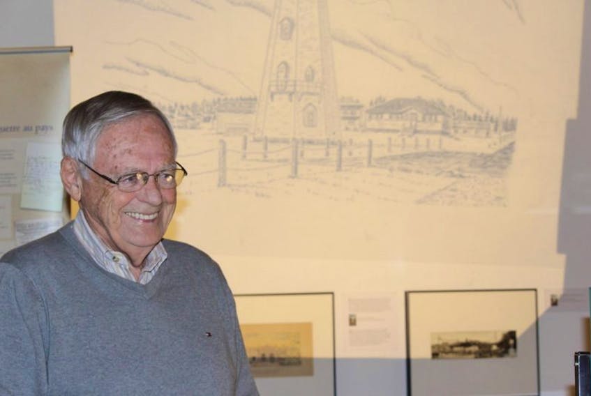 Sterling Stratton smiles as he tells the story of the East Point Light House, during his presentation at the Eptek Art and Culture Centre in Summerside on Saturday. 