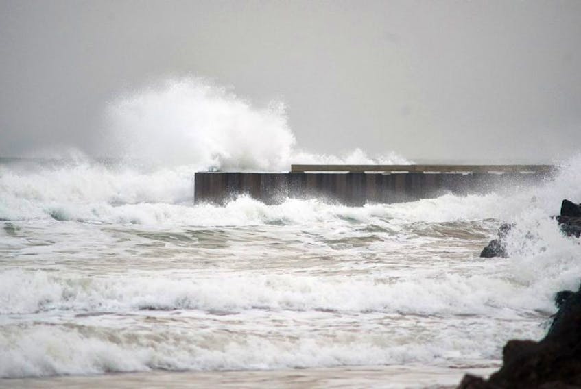 High waves pound the North Rustico breakwater.