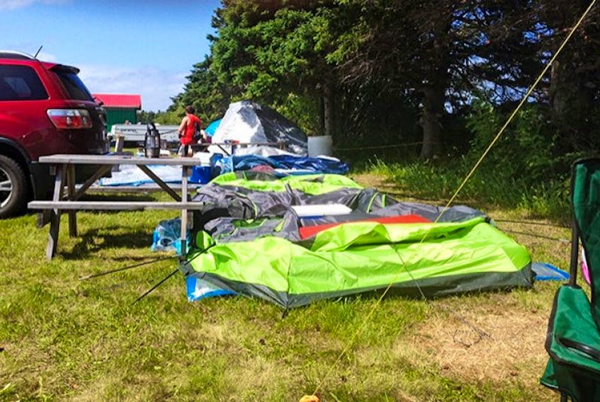 <span>Angela Veness took this picture of collapsed tents at Raceway Park in Oyster Bed Bridge on Sunday after incurring the wrath of post tropical storm Arthur over the weekend. It was one of the official sites people could camp out in tents for the Cavendish Beach Music Festival.</span>