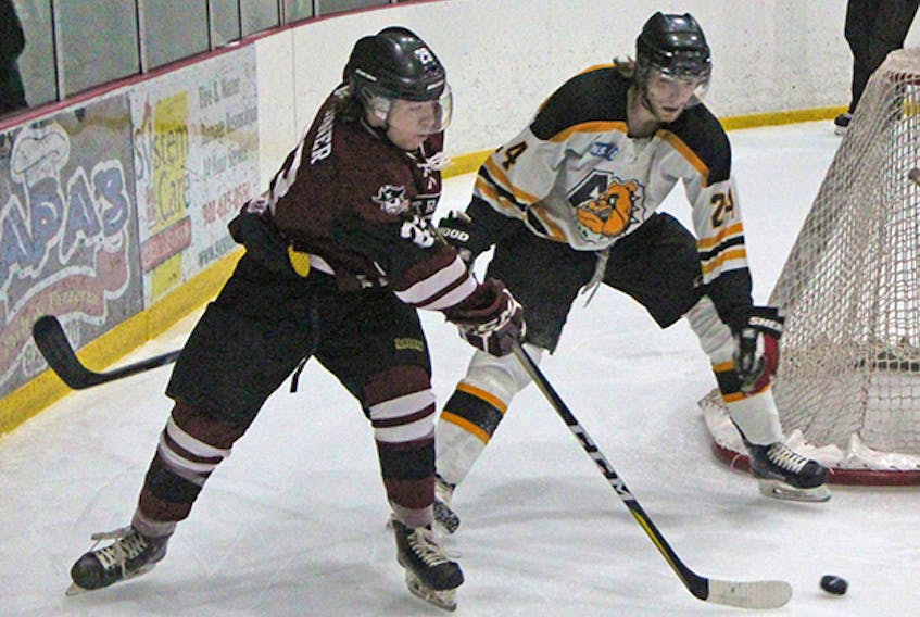 Avery Warner (with puck) of the Strait Pirates challenges Antigonish Bulldogs’ defenseman Kieran Devine in the 2019 Nova Scotia Junior Hockey League playoffs. Warner will be one of the returning forwards this season on a roster that will vie for a league crown. Corey LeBlanc