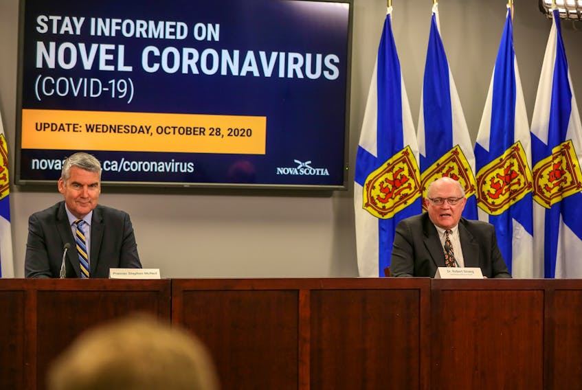 Nova Scotia Premier Stephen McNeil and Dr. Robert Strang, the province's chief medical officer of health, hold a COVID-19 news briefing Wednesday in Halifax.