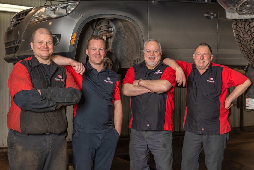 Wendell Taylor’s Garage in Stratford is giving out free oil changes to anyone who works in the health-care system on P.E.I. From left, are Ryan Mooney, Jeff Ford (owner), Clarence Ellis and Mark Rogers. This picture was taken before physical distancing rules were put in place. 