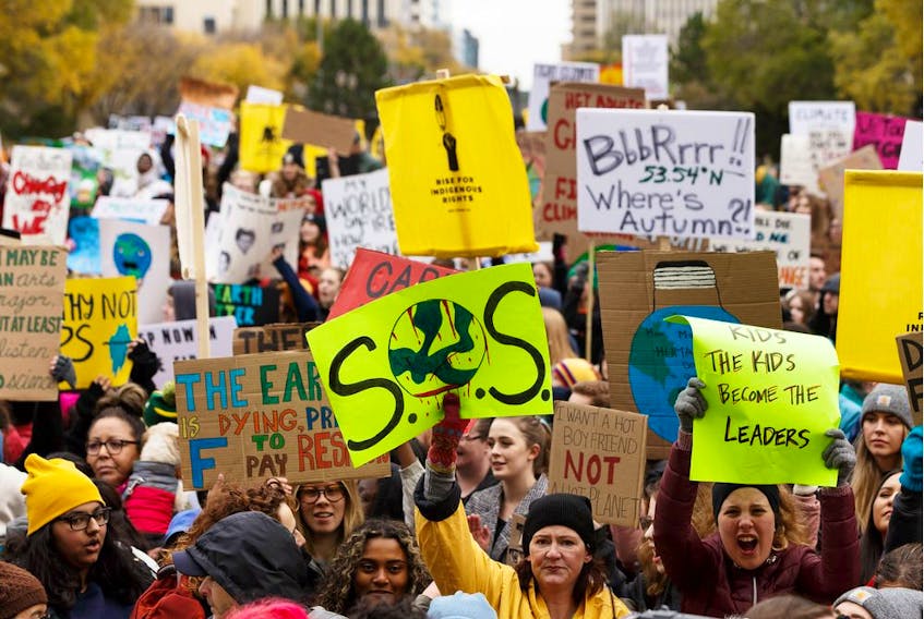 Edmontonians rally during the Global Climate Strike at the Alberta Legislature in Edmonton, on Friday, Sept. 27, 2019. Thousands of students across the country joined together to call for action on climate change.