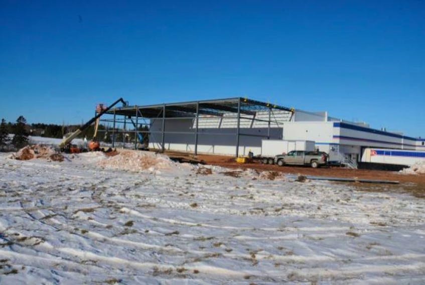 A construction crew work on a new expansion to the Summerside ADL distribution centre. The project will add about 7,500 square feet of space to the existing building and is expected to be completed by April.