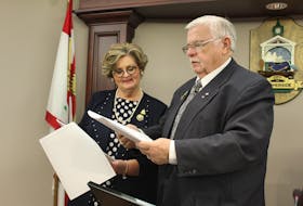 Colin MacLean/Journal Pioneer 
Summerside deputy mayor Norma McColeman and Mayor Basil Stewart look over a copy of the city's 2020/2021 budget, which was released earlier this month.
