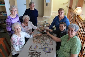 The winners of this year's Chesapeake Suites Jigsaw Puzzle Race was the team at Summerside's Chesapeake Heights. The company holds a puzzle race annually between its four retirement living buildings. The team was, from the rear left going counter-clockwise, was Anna Johnstone, Wilna Warren, Ella Simmons, Jean Millar, Gloria Lucas, Corinne Kay, Bertha Richard and Mimi Duhamel (not present). Colin MacLean/Journal Pioneer
